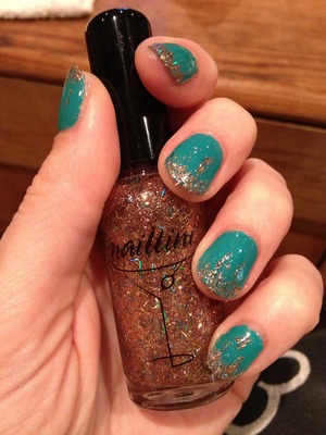 Sinful nail polish color "Rise and Shine" with the gold painted backwards toward the cuticle. 