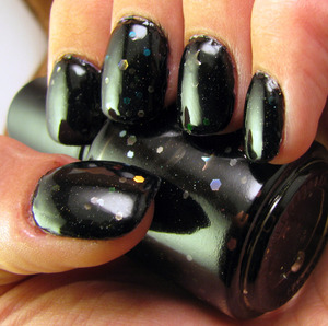 Virus Insanity nail polish available at http://www.virusinsanity.com. One coat of Sally Hansen Black Heart, two coats of Virus Insanity All Hallows Eve with two coats of Seche Vite.