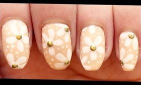 White Flowers on Nude nail art