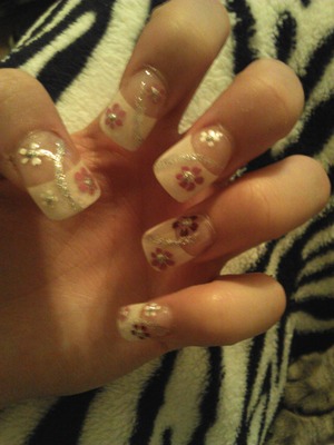 Hawaiian flowers & touch of sliver Did them myself. ! :)