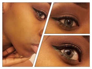 A neutral smoky look I created accented with a black and green winged liner