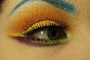 ..slightly insane eye makeup with poorly done eyebrows.