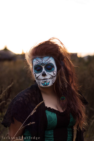 This shoot was done for a Day of the Dead shrine I'm helping construct at my college. It is my first Sugar Skull makeup.