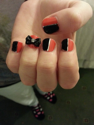 I done my friend's nails with black flocking powder and a cute bow on the accent nail :)