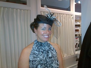 Sally's finished style complete with hat! http://beautybylindsay.blogspot.com/2012/05/derbylicious-updo-tips.html