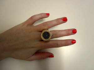 this ring is just awsome! I adore it :D the nail polish I'm using is called 402 by F.Flormar (just bought it from our local drugstore so I don't know if anyone knows the brand... because I don't :D)