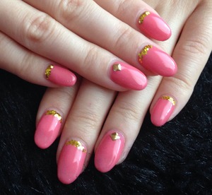 Pink, gold glitter and studs. Oval nails 
