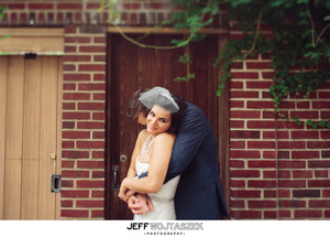 Short hair bride with messy curls . Mauve eye shadow and airbrush makeup.
