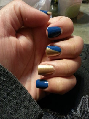 I chose my school colors blue and gold to inspire my nails for  graduation!