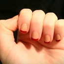 Neutral nails with red tip  