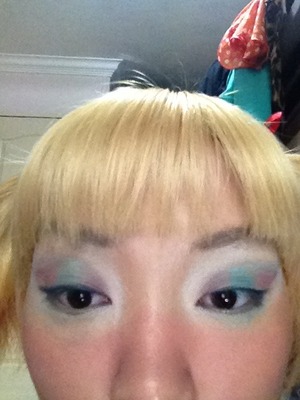 Was experimenting for a performance. Meant to be a Dorothy doll kinda makeup but looks turned out to be more circus-ish.
