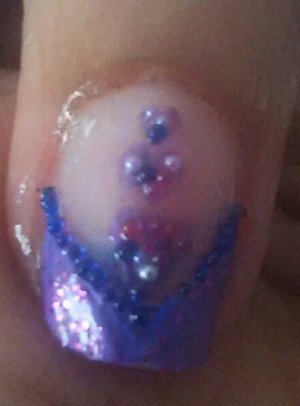 I used Luxe Lavender shade and  Avon Sprinkle,  Nail Art Diva Top Coat