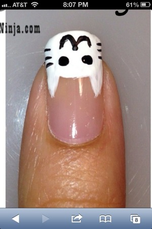 Simple shapes and whiskers will add a lot to your nails