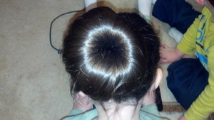 My 5 year old niece's 1st sock bun. Should have used a smaller sick looks kinda big on her little head.