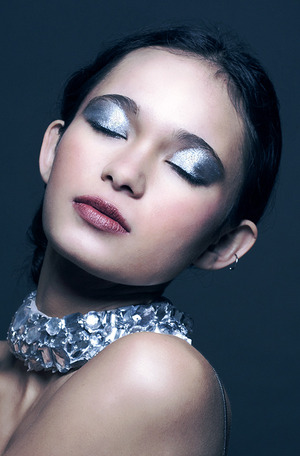 Detail beauty shot from editorial with Buxom Silver eyeshadow.