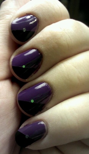 Sinful Colors' Amethyst and Black on Black with a one dot of chunky glitter.