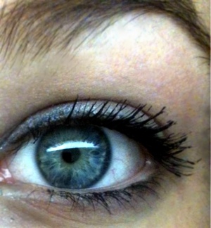 Blue eyes with a tad bit of shimmer eye shadow.