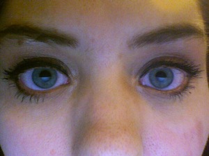 I really need to pluck my brows...ugh. 
Sorry about the shotty webcam photo, my camera's broken. :S