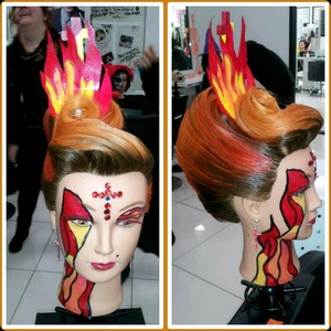 This is a hairstyle I did for a fantasy hair competition at Toni and Guy hairdressing academy in phila my theme was Sacred Flames I hope you guys enjoy my work IG: @drk_nlovely215 
