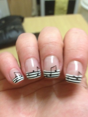 Use a fine nail art brush to sweep the lines of the stave then add your own notes