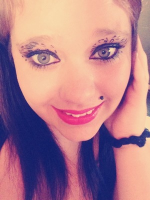 Don't be ordinary. Draw half circles on your eye shadow with eye liner. Be freaky. Have fun.