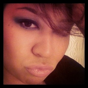 Light smoke with a nude mouth.