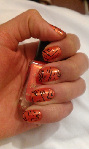 Experimenting with Tiger themed stripes/ Black nail art pen.