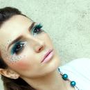 Blue Feather and Rhinestone Makeup
