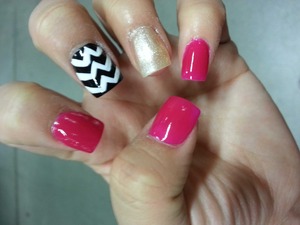 neon pink with black and white zig zag and goldish glitter