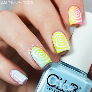Read more on my blog here: http://www.nails-by-erin.com/2015/01/rainbow-swirl-nails.html

And watch my YouTube tutorial here: https://www.youtube.com/watch?v=j4DCXH5vN8k