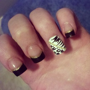 Leopard/zebra, black tips, gold trim