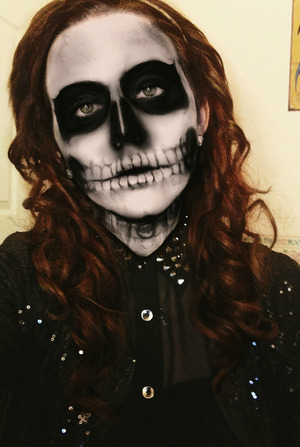 I did this for Halloween, huge fan of the show and Tate :) I used black eye shadow (any works, but a good quality one is best), eye liner (liquid/cream), white face paint, and translucent powder.