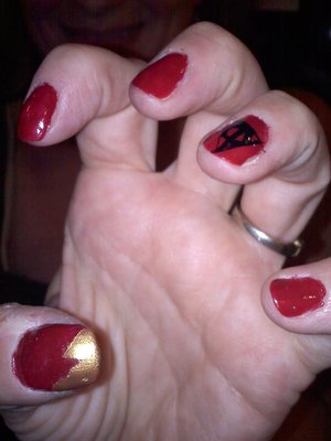 Harry Potter Nails! The thumb is a lightening bolt and the ring finger is the deathly hallows!