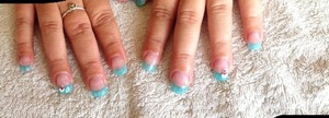 Sculptured blue french acrylic nails with snowman.
http://bobbydazzlerbeauty.blogspot.co.nz/