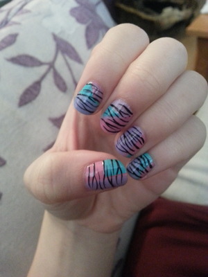 I thought I use some pastels for spring along with a tiger print :) 
