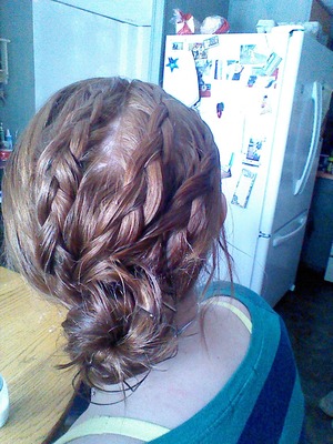 Three dutch braids, sweeping into a bun, a great every day hairstyle for work and school.