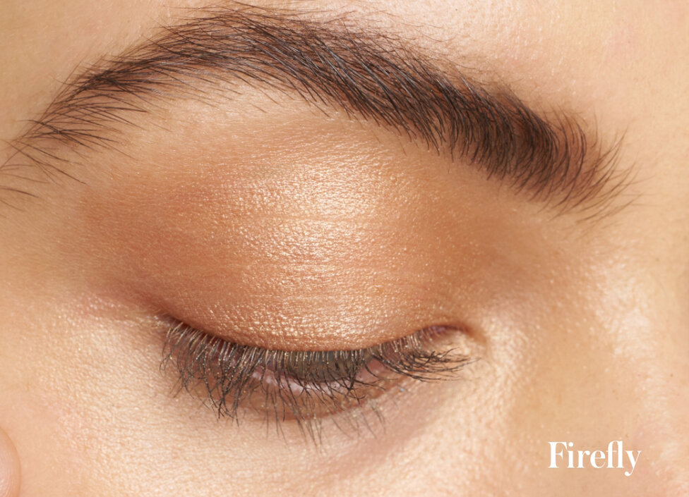 Model wearing the shade Firefly from the rms beauty Midnight Bloom ReDimension Hydra Eyes Quartet