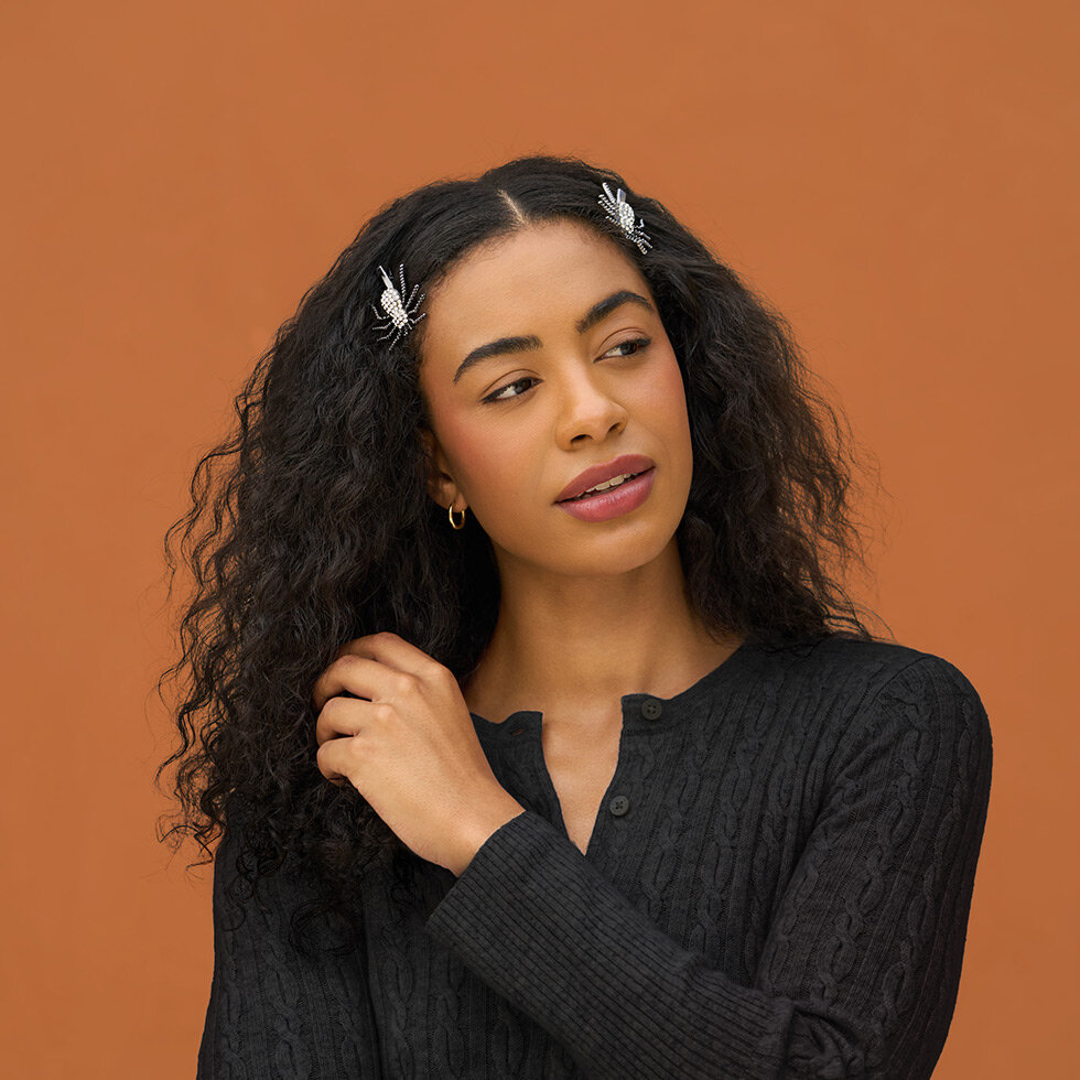 Model wearing Kitsch Spider Metal Rhinestone Hair Clips