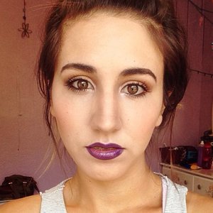 My look was created with a simple golden eye look which allowed the lips to have center stage. I created the lip look by covering my entire lips with Wet N Wild Purple Eyeliner and then topping that with Mary Kay @ Play Lip Jelly in purple.
