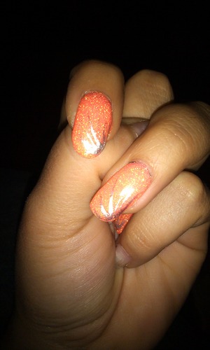 peach gel nails with a winged silver corner edge :)
