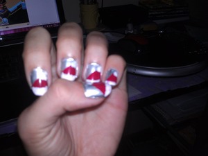 chrome(revlon doesn't sell it anymore) underlying with red (pure ice siren) and white Christmas Hats sorry for the crappy photo quality