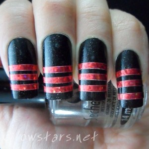 A mani created with craft striping tape. To find out more please visit http://glowstars.net/lacquer-obsession/2012/09/30-days-of-untrieds-stripes