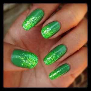 Colors used are, Essie Mojito Madness, and Sally Girl Sparkle Effect Loose Glitter in Gleaming Green. :)