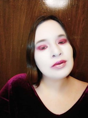 Modern-day geisha makeup.