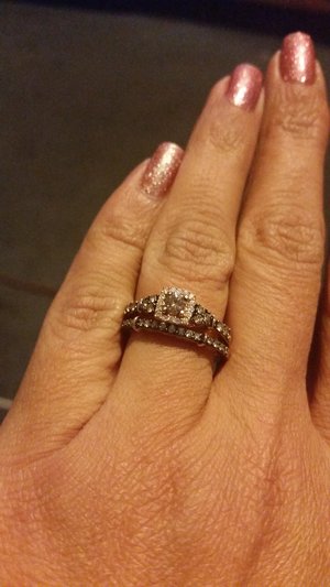 my LeVian ring is now complete my king suprised me with a matching band for Christmas early. It's champagne, chocolate, and vanilla diamonds set in strawberry gold (: