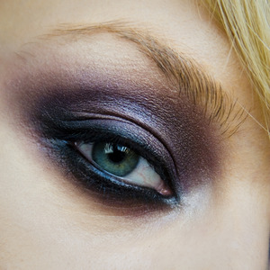 smokey eyes make-up, using shades of deep violet and grays