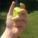 Bright yellow nail polish