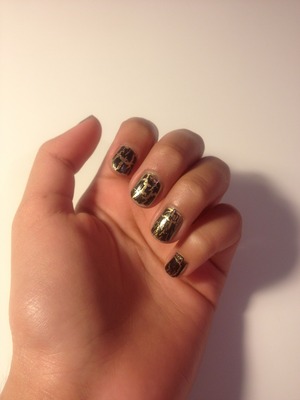 Black opi shattered nail polish with gold!! 
