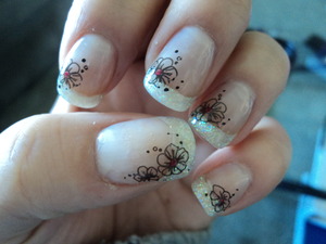 Acrylic white glitter tips with flower stamps