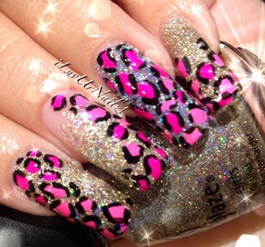 The colors I used are Chiba Glazes I'm not Lion, Pink Voltage, Purple Panic and Snow Globe in my ring Finger I used Color Clubs SugarPlum Fairy at the tips to darken it up a bit I used Funky Fingers Star Studded and Acrylic Black paint to go my leopard spots 
http://iluvurnailz.tumblr.com/